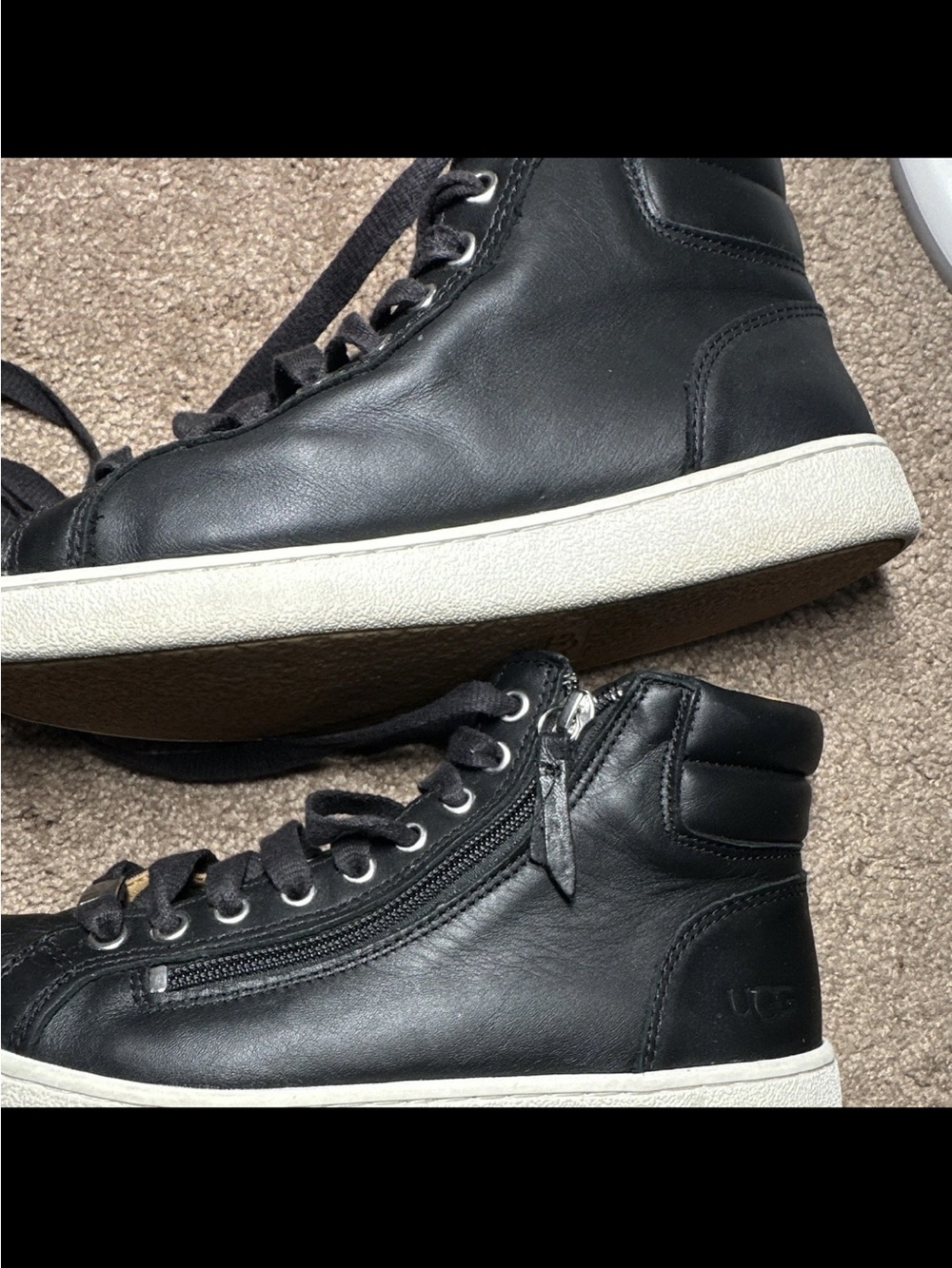 UGG Women’s Black Leather High-Top Sneakers with Cream Sole
